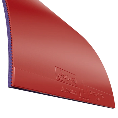 Red Joola Dynaryz AGR rubber showing the topsheet and sponge edge